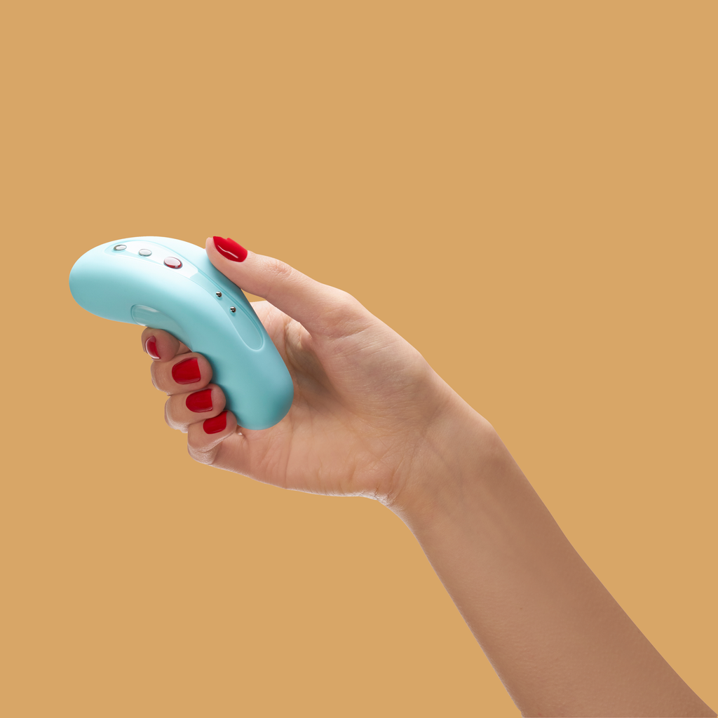 Image of a hand holding the Laya 2 in Pool Blue. The Laya 2 by Fun Factory fits nicely within the hand. Similar size to that of a computer mouse.