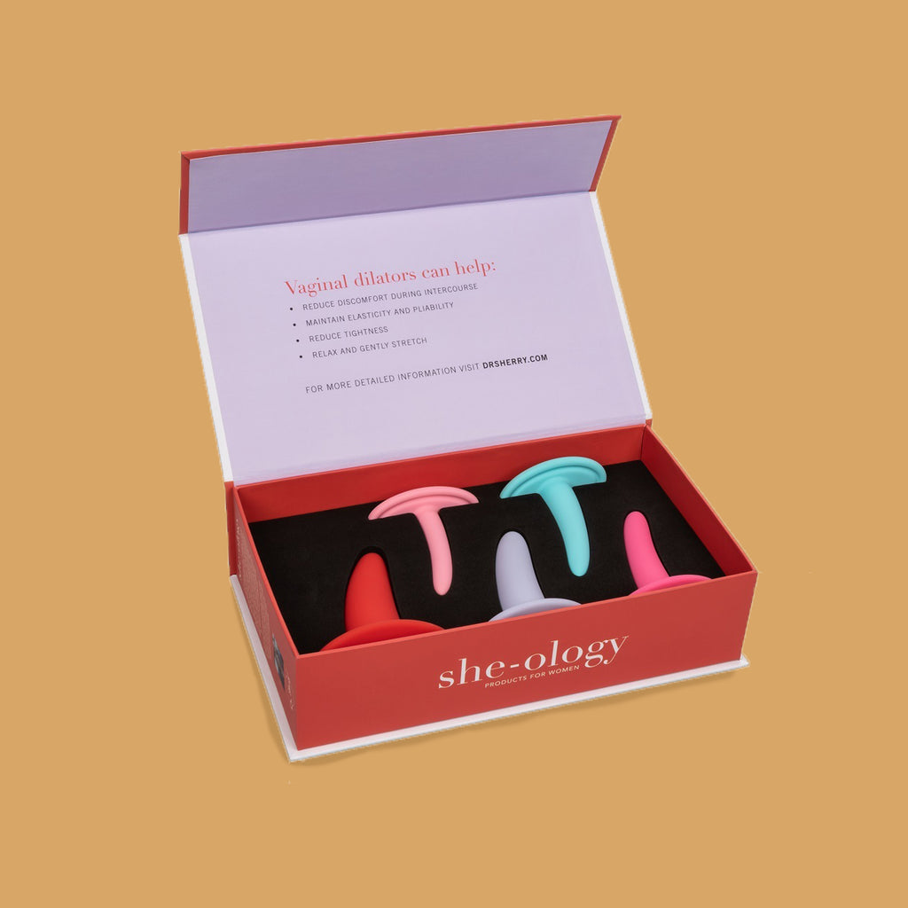 The Dilator Set by She-Ology Cal-Exotics in its box. The box reads "She-ology on the front. The information on the inside of the box reads: - reduce discomfort during intercourse, maintain elasticity and pliability, reduce tightness, relax and gently stretch. 