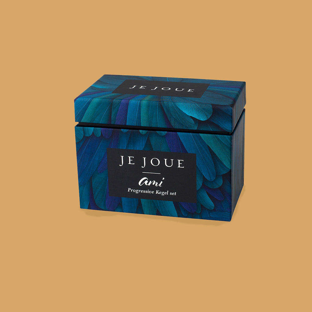 The packaging of the Ami Kegel Balls set. The packaging is green and blue and reads Je Joue Ami Progression Kegel Set. Accessible sex toys XES Products