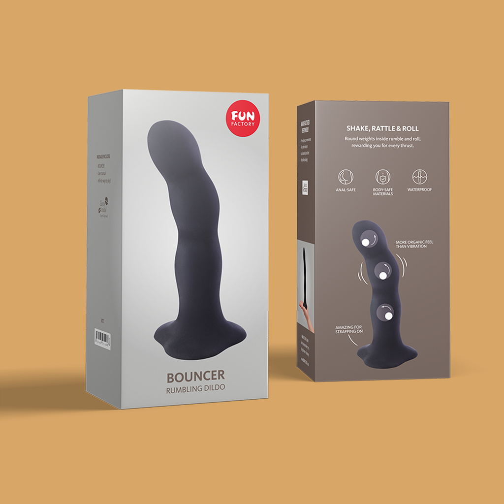 Image of the Bouncer Rumbling Dildo Black in its packaging.  